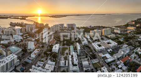 Above view of Sarasota city, Florida with waterfront office high-rise buildings and John Ringling Causeway leading from downtown to St. Armands Key. Development of housing and transportation in the US 124205199
