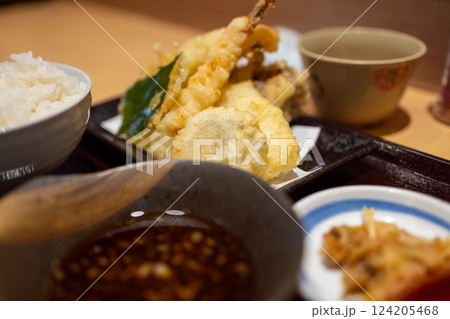 Japanese teishoku meal featuring assorted tempura, including shrimp, vegetables, and mushrooms Japanese teishoku meal featuring assorted tempura, including shrimp, vegetables, and mushrooms 124205468