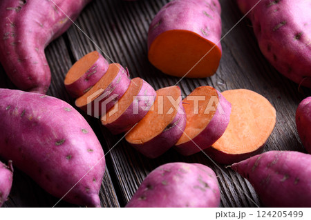 Close up of pink organic raw sweet potatoes 124205499