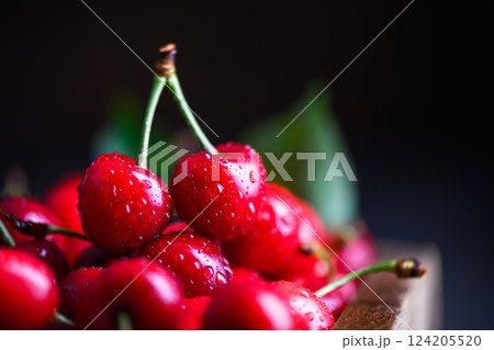 Red cherries with waterdrops close up 124205520