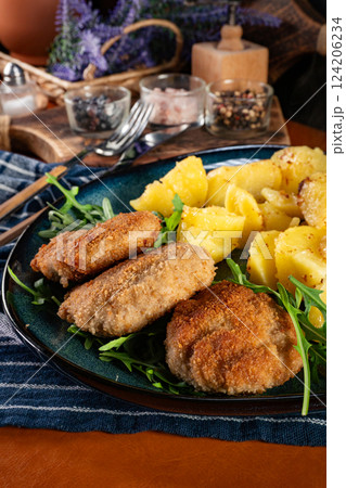 Meatballs with cheese served with boiled potatoes. Meatballs with cheese served with boiled potatoes. 124206234