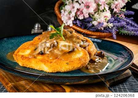 Potato cutlets with mushroom sauce. 124206368