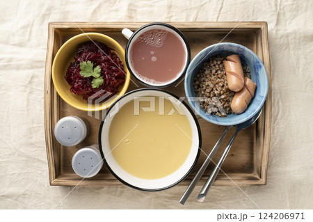Set lunch in bowls in a wooden serving box Set lunch in bowls in a wooden serving box 124206971