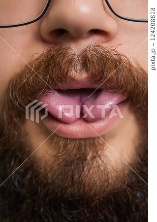 tongue splitting. cutting the tongue, one type of modification of the human body. surgery concept. 124208818
