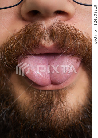 tongue splitting. cutting the tongue, one type of modification of the human body. surgery concept. 124208819