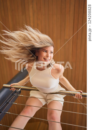 Dynamic and Expressive Portrait of a Woman Captured in Artistic Motion and Movement 124208828