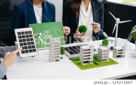 Business team people planning hand using laptop for working technology and business Net zero and carbon neutral concept.NET ZERO icons and symbols save the eco world and reduce pollution. Business team people planning hand using laptop for working technology and business Net zero and carbon neutral concept.NET ZERO icons and symbols save the eco world and reduce pollution. 124213007