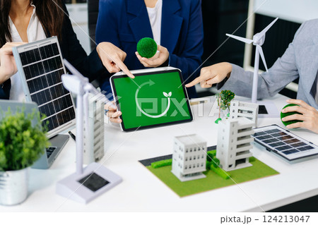 Business team people planning hand using laptop for working technology and business Net zero and carbon neutral concept.NET ZERO icons and symbols save the eco world 124213047