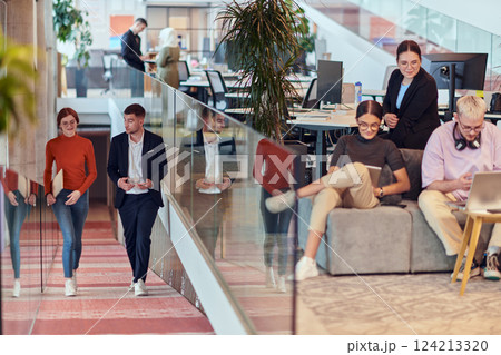 In a modern startup office, a diverse group of young professionals collaboratively tackles various business problems and challenges, surrounded by their engaged colleagues, fostering innovation and 124213320