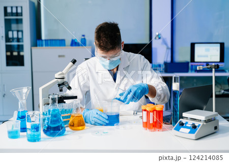 Scientists, beakers, and microscopes in cutting-edge research. Perfect for science and technology projects. Scientists, beakers, and microscopes in cutting-edge research. Perfect for science and technology projects. 124214085
