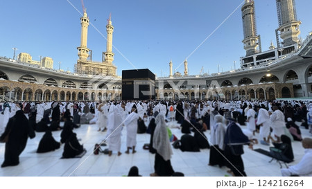 Muslim pilgrims perform Tawaf around the Kaaba after dawn prayer at Masjid al-Haram in Makkah, Saudi Arabia. Muslims worldwide face the Kaaba in prayer, symbolizing unity and devotion in Islam 124216264