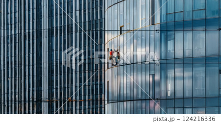 Worker cleaning windows on a high rise building.Generated image Worker cleaning windows on a high rise building.Generated image 124216336