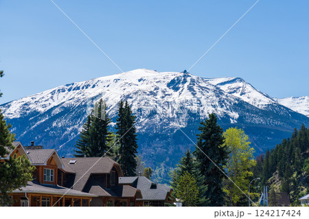 Jasper town summer landscape with The Whistlers Peak in the background. Jasper National Park, Alberta, Canada, Canadian Rockies. Jasper town summer landscape with The Whistlers Peak in the background. Jasper National Park, Alberta, Canada, Canadian Rockies. 124217424