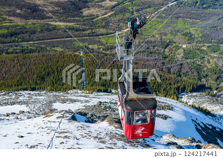 Jasper, Alberta, Canada - May 21 2021 : Jasper SkyTram aerial tramway ascending the snow-capped Rocky Mountains. Jasper, Alberta, Canada - May 21 2021 : Jasper SkyTram aerial tramway ascending the snow-capped Rocky Mountains. 124217441