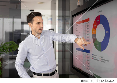 Business project manager man analyzing sales report 124218302