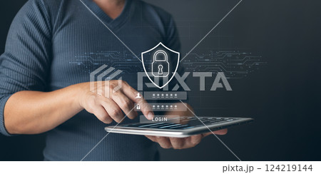 Cybersecurity and privacy concepts to protect data. Lock icon and internet network security technology. Businessman protecting personal data on laptop with virtual screen interfaces. 124219144