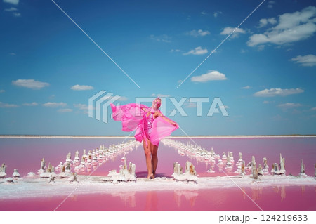 Pink Lake Woman Dress Mexico: Stunning photoshoot, vibrant pink salt flats, summer fashion. 124219633