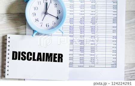 A symbol of disclaimer. The concept word Disclaimer on the notepad.  124224291