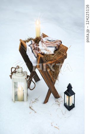 Manger on the snow. Christmas background 124225116