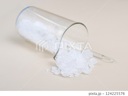 Zinc nitrate on the beige background 124225576