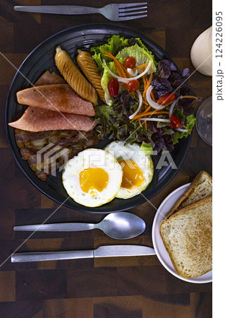 Above View Of A Breakfast Set On A Wooden Table 124226095