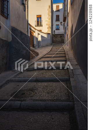 ancient stairs with pavement of old cozy European town, Cuenca, Spain 124228988