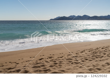 Sand beach of South France during spring with sea waves 124229102
