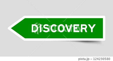Green color arrow shape sticker label with word discovery on gray background 124230580