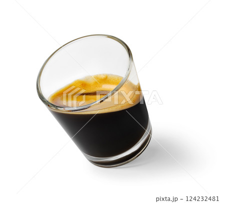 Small glass coffee angling, dark espresso revealing golden crema layer, isolated on white background 124232481
