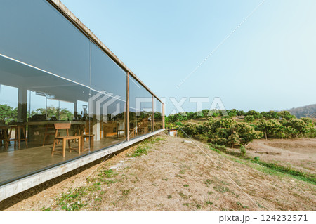 Modern cafe exterior with glass windows Modern cafe exterior with glass windows 124232571