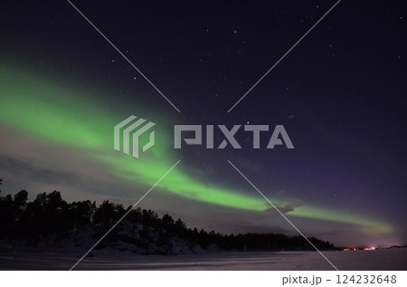 Inari, Finland, is located within the Arctic Circle and has a high chance of seeing the Northern Lights. 124232648