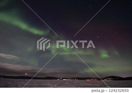 Inari, Finland, is located within the Arctic Circle and has a high chance of seeing the Northern Lights. 124232650
