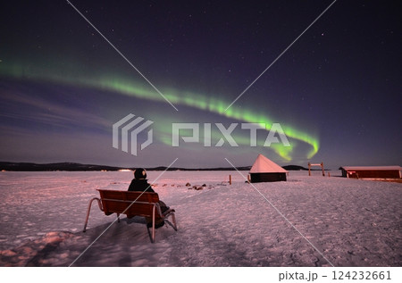 Inari, Finland, is located within the Arctic Circle and has a high chance of seeing the Northern Lights. 124232661