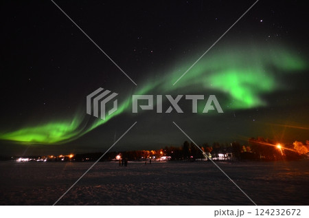 Inari, Finland, is located within the Arctic Circle and has a high chance of seeing the Northern Lights. 124232672