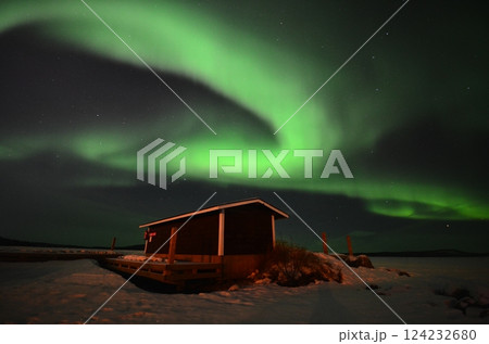 Inari, Finland, is located within the Arctic Circle and has a high chance of seeing the Northern Lights. 124232680
