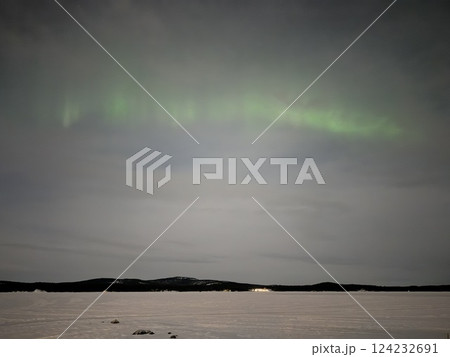 Inari, Finland, is located within the Arctic Circle and has a high chance of seeing the Northern Lights. 124232691