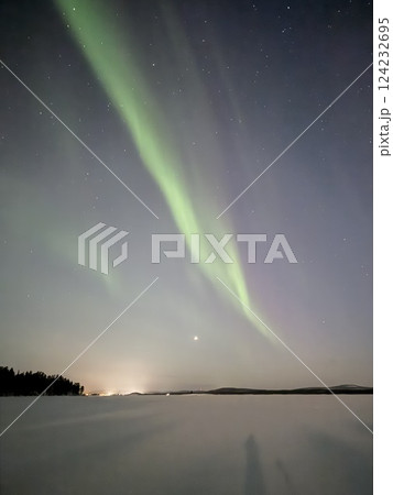 Inari, Finland, is located within the Arctic Circle and has a high chance of seeing the Northern Lights. 124232695