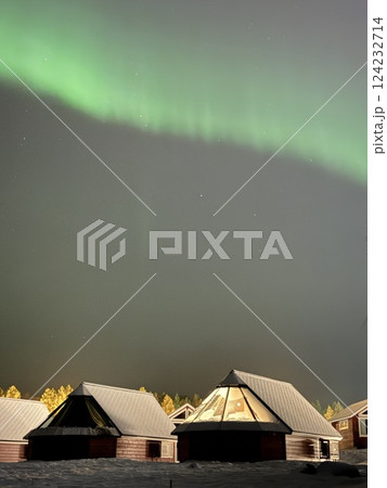 Inari, Finland, is located within the Arctic Circle and has a high chance of seeing the Northern Lights. 124232714