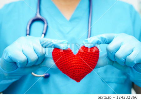 Asian woman doctor holding red heart for health in hospital. 124232866