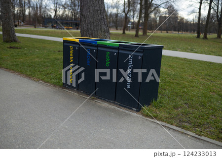 Trash Bins for Recycling in the Park, Different Containers for Waste Sorting Trash Bins for Recycling in the Park, Different Containers for Waste Sorting 124233013