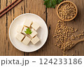 Fresh Sliced Soft Tofu soy bean curd on white plate.Top view 124233186