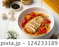 Grilled chicken breast with spaghetti tomato sauce in white plate 124233189