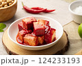 Fermented bean curd in white plate(Red Sufu) ,Chinese Cheese 124233193