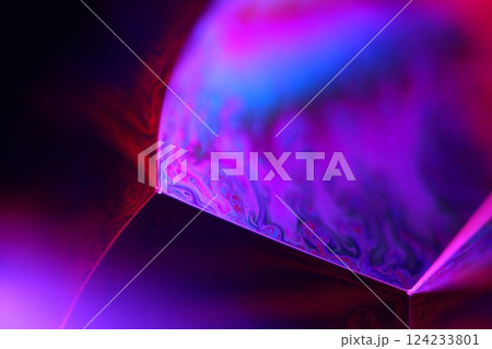 Red and purple fluid reflections on black background, liquid surface abstraction, colour edge, deep dark backgrounds, geometric water shapes, fluids movement, phenomenal physical features 124233801