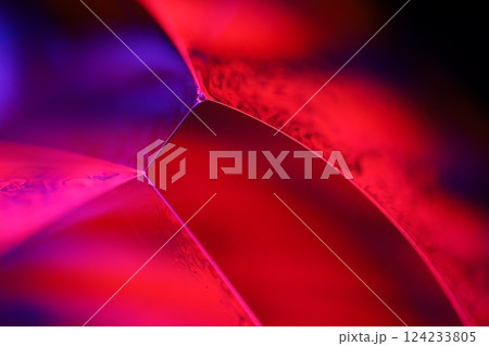 Red and purple fluid reflections on black background, liquid surface abstraction, colour edge, deep dark backgrounds, geometric water shapes, fluids movement, phenomenal physical features 124233805