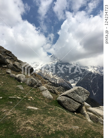 Scenic view of Dhauladhar range covered with snow and clouds. Overcast weather in the Indian Himalayas. Triund trek, Dharamsala, Himachal Pradesh, India. 124234723