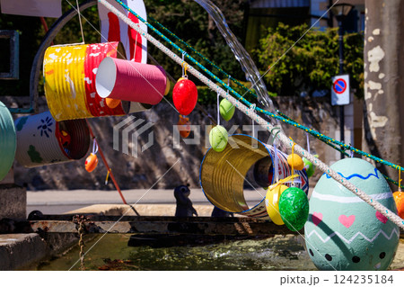 Festive decorations for Easter holiday on the fountain in Nyon, Switzerland 124235184