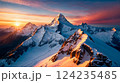Picturesque aerial view of snowy mountain range during the sunset 124235485