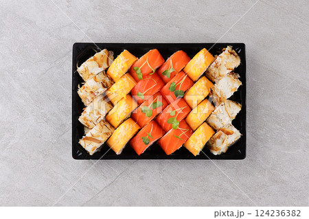 Japanese sushi rolls, sushi sets on a gray background for restaurant menu and food delivery 124236382