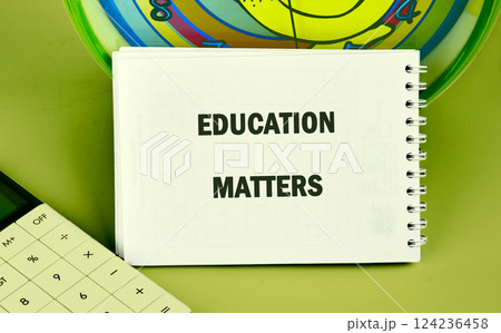 A notebook displaying the phrase Education Matters sits next to a calculator and colorful clock, emphasizing the importance of financial literacy and business knowledge A notebook displaying the phrase Education Matters sits next to a calculator and colorful clock, emphasizing the importance of financial literacy and business knowledge 124236458
